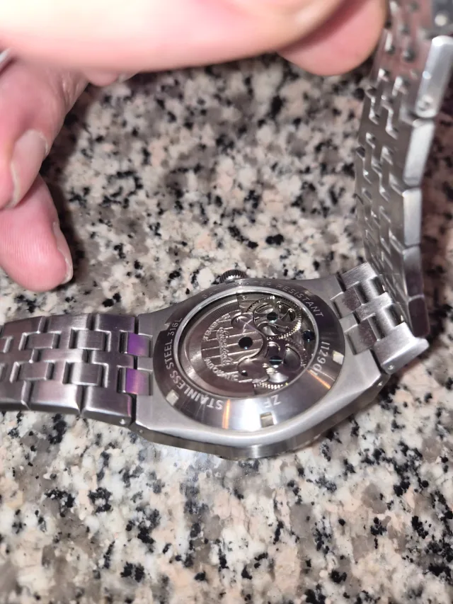 Ingersoll watch case back showing automatic movement